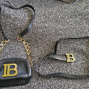 Black Leather Bag with Gold Accents